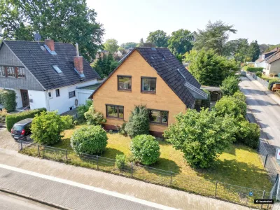 Ansicht · Viel Platz für den eigenen Stil - Einfamilienhaus in der Moorwegsiedlung · Bild 18 von 18 · IMMO Holm