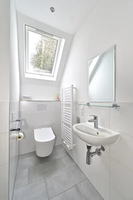 Ansicht · Großzügiges Reihenmittelhaus mit schönem Wintergarten in Holm! · Bild 6 von 15 · IMMO Holm