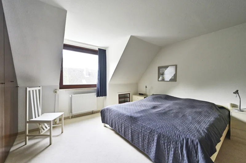 Ansicht · Großzügiges Reihenmittelhaus mit schönem Wintergarten in Holm! · Bild 8 von 15 · IMMO Holm