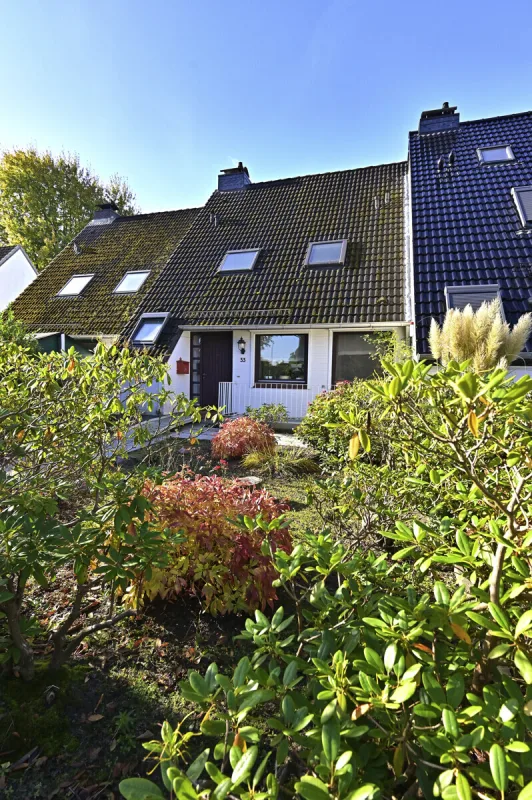 Ansicht · Großzügiges Reihenmittelhaus mit schönem Wintergarten in Holm! · Bild 15 von 15 · IMMO Holm