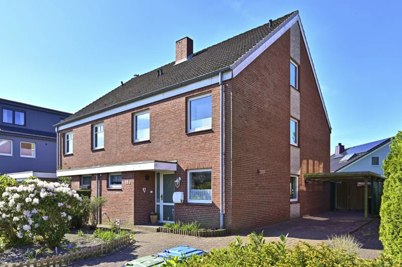 Ansicht · Doppelhaushälfte in Holm mit schönem Garten und viel Platz - 
Ideal für Familien! · Bild 3 von 20 · IMMO Holm