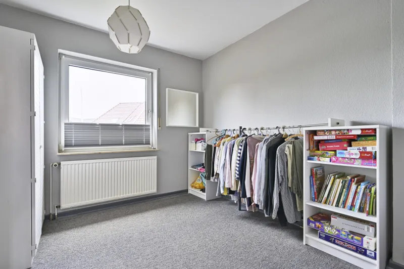 Ansicht · Doppelhaushälfte in Holm mit schönem Garten und viel Platz - 
Ideal für Familien! · Bild 12 von 20 · IMMO Holm