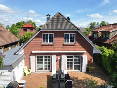 Ansicht · Ihr Traumhaus in Hetlingen: Wohnen mit Stil, Komfort und Badespaß · Bild 2 von 30 · IMMO Holm