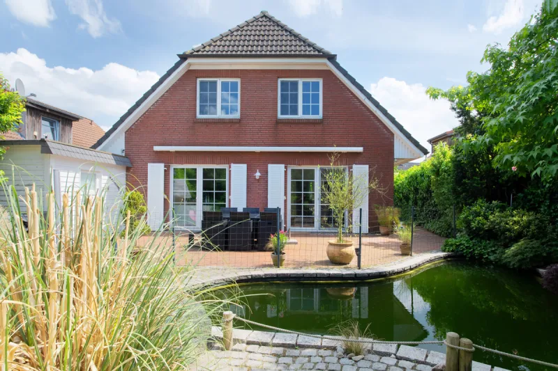 Ihr Traumhaus in Hetlingen: Wohnen mit Stil, Komfort und Badespaß · Titelbild · IMMO Holm