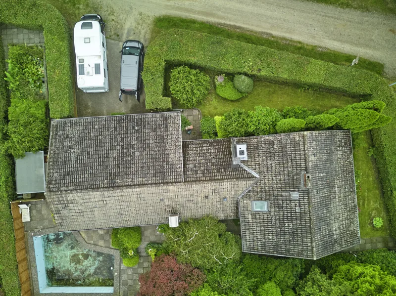 Ansicht · Am Waldrand – Einfamilienhaus mit Einliegerwohnung · Bild 2 von 13 · IMMO Holm