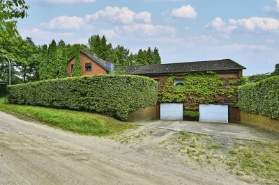 Ansicht · Am Waldrand – Einfamilienhaus mit Einliegerwohnung · Bild 3 von 13 · IMMO Holm