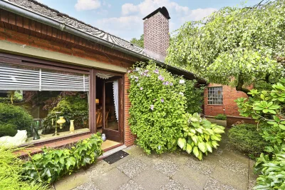 Ansicht · Am Waldrand – Einfamilienhaus mit Einliegerwohnung · Bild 5 von 13 · IMMO Holm