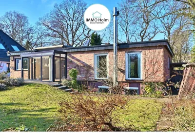 Wohnen auf einer Ebene – Familienbungalow mit Garten & Potenzial · Titelbild · IMMO Holm