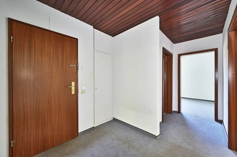 Ansicht · Charmante 3-Zimmer-Wohnung - Südbalkon, Garage & Platz für Ideen · Bild 5 von 18 · IMMO Holm