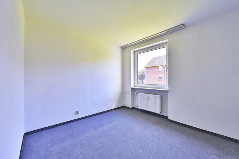 Ansicht · Charmante 3-Zimmer-Wohnung - Südbalkon, Garage & Platz für Ideen · Bild 10 von 18 · IMMO Holm