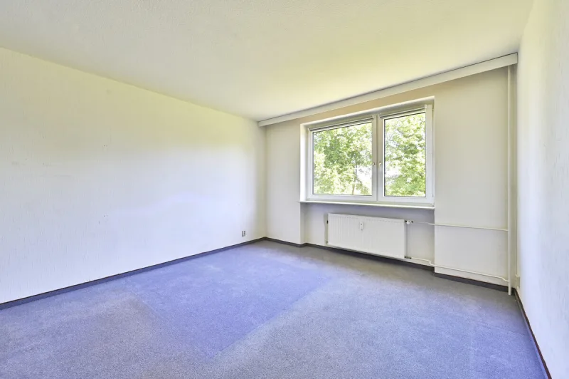 Ansicht · Charmante 3-Zimmer-Wohnung - Südbalkon, Garage & Platz für Ideen · Bild 11 von 18 · IMMO Holm