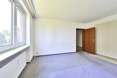 Ansicht · Charmante 3-Zimmer-Wohnung - Südbalkon, Garage & Platz für Ideen · Bild 12 von 18 · IMMO Holm