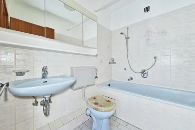 Ansicht · Charmante 3-Zimmer-Wohnung - Südbalkon, Garage & Platz für Ideen · Bild 16 von 18 · IMMO Holm