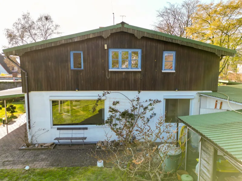Ansicht · Doppeltes Reihenendhaus - genügend Raum für die ganze Familie! · Bild 2 von 30 · IMMO Holm