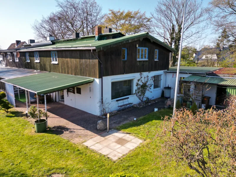 Ansicht · Doppeltes Reihenendhaus - genügend Raum für die ganze Familie! · Bild 23 von 30 · IMMO Holm