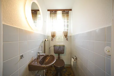 Ansicht · Beste Lage für die Familie - Reihenendhaus in der Moorwegsiedlung · Bild 13 von 25 · IMMO Holm