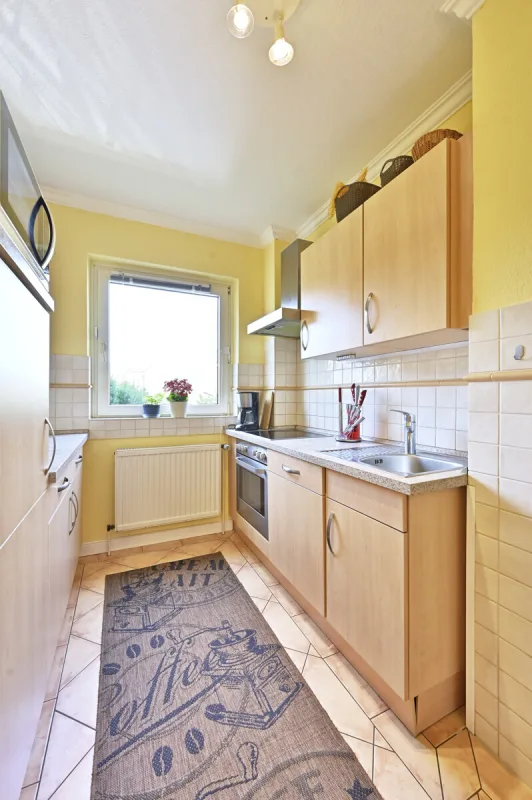 Ansicht · Vermietetes Reihenmittelhaus in schöner Lage von Appen · Bild 5 von 11 · IMMO Holm