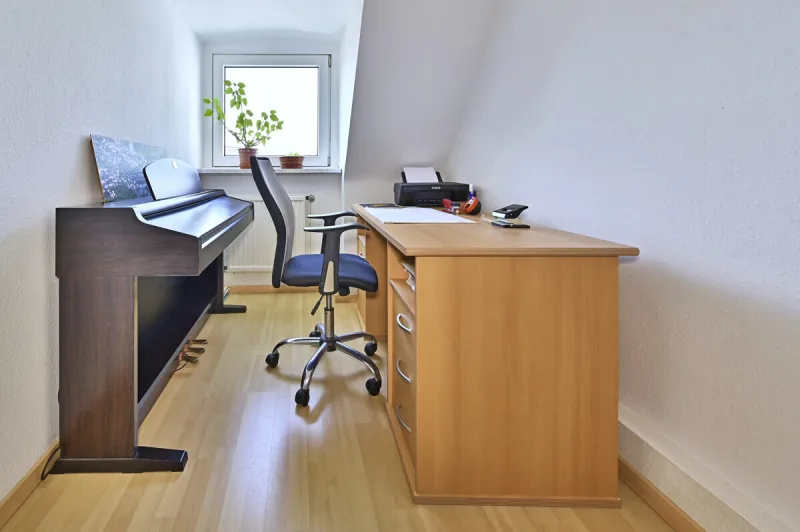 Ansicht · Vermietetes Reihenmittelhaus in schöner Lage von Appen · Bild 8 von 11 · IMMO Holm