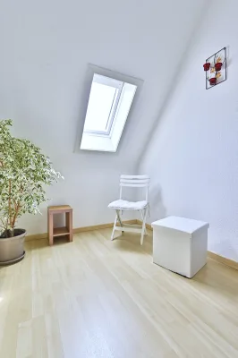 Ansicht · Vermietetes Reihenmittelhaus in schöner Lage von Appen · Bild 9 von 11 · IMMO Holm
