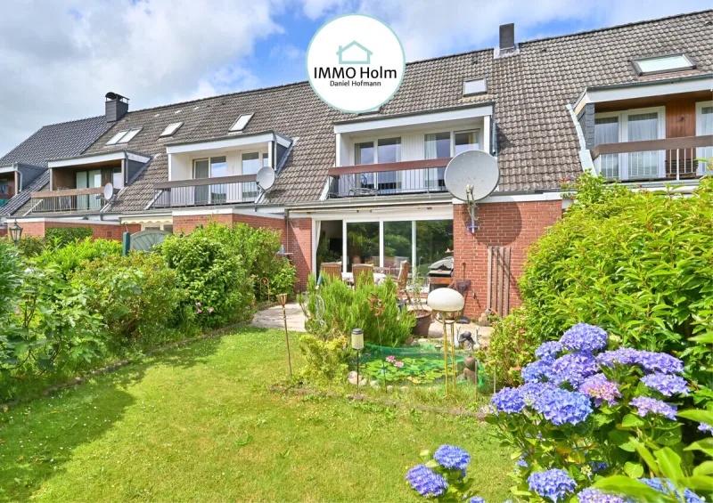 Ansicht · Mehr Haus als erwartet - ein Reihenmittelhaus, das sich vom erwarteten abhebt · Bild 18 von 19 · IMMO Holm